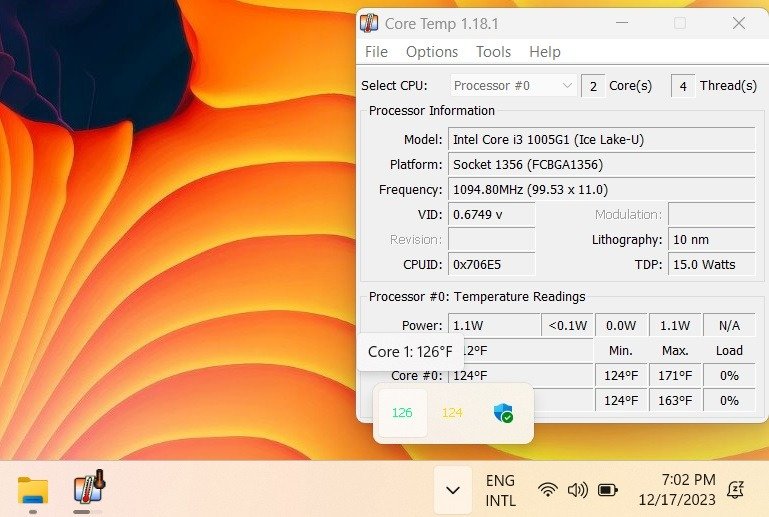 Температура ядра процессора отображается на панели задач Windows 11 с помощью приложения Core Temp.