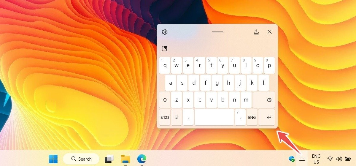 Сенсорная клавиатура в Windows 11 доступна через значки на панели задач.