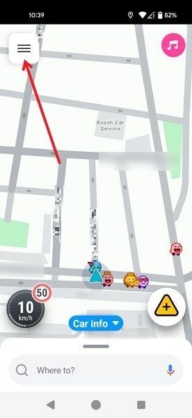 Нажатие на гамбургер-меню в приложении Waze на экране навигации.