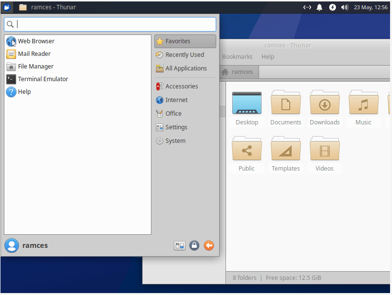 Снимок экрана, показывающий панель меню и файловый менеджер в Xubuntu.