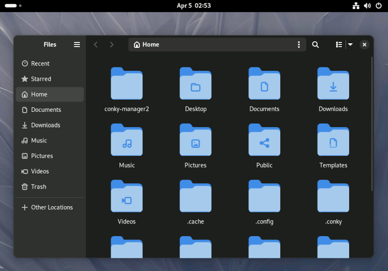 Рабочий стол GNOME с файловым менеджером, открытым в Fedora