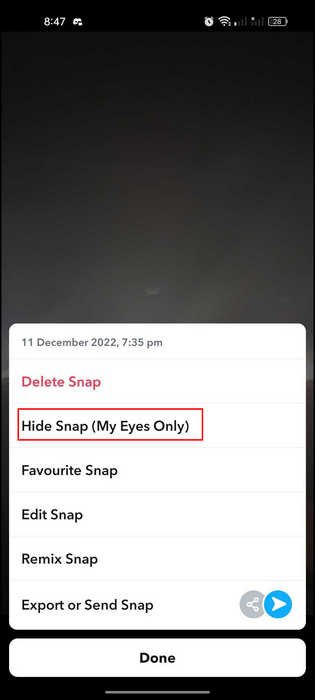 Нажатие на опцию «Скрыть снимок» в Snapchat.