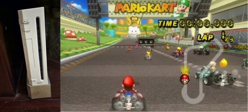 Nintendo Wii рядом с стартом гонки в Mario Kart.