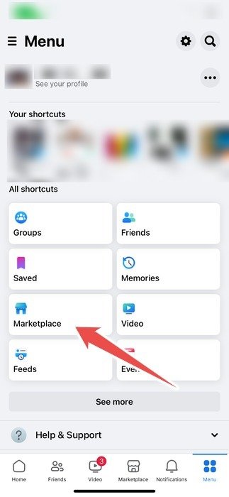 Кнопка Marketplace на странице меню в приложении Facebook на Iphone