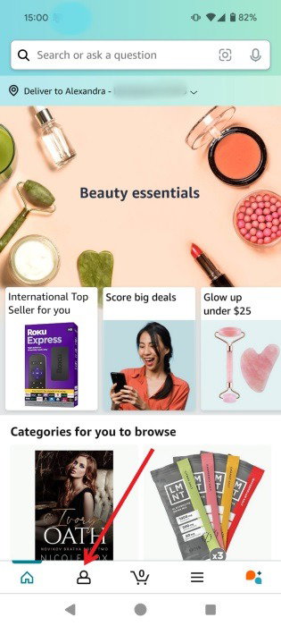 Нажатие на значок, похожий на человека, в приложении Amazon Shopping на Android.